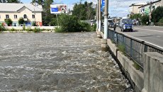 Мост на улице Комсомольская в Чите через реку Читинка. Архивное фото Мост на улице Комсомольская в Чите через реку Читинка. Архивное фото