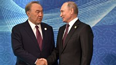 Владимир Путин и президент Казахстана Нурсултан Назарбаев на церемонии встречи глав государств-участников V Каспийского саммита в Актау. 12 августа 2018 Владимир Путин и президент Казахстана Нурсултан Назарбаев на церемонии встречи глав государств-участников V Каспийского саммита в Актау. 12 августа 2018