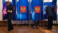 Избиратели в единый день голосования на избирательном участке Избиратели в единый день голосования на избирательном участке