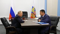 Президент РФ Владимир Путин и временно исполняющий обязанности губернатора Приморского края Андрей Тарасенко Президент РФ Владимир Путин и временно исполняющий обязанности губернатора Приморского края Андрей Тарасенко
