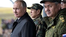 Владимир Путин на параде участников военных маневров Восток-2018 на забайкальском полигоне Цугол. 13 сентября 2018 Владимир Путин на параде участников военных маневров Восток-2018 на забайкальском полигоне Цугол. 13 сентября 2018