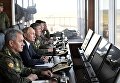 Верховный главнокомандующий ВС РФ, президент РФ Владимир Путин наблюдает за ходом военных маневров российских, монгольских и китайских вооруженных сил Восток-2018 с командного пункта на полигоне Цугол в Забайкальском крае Верховный главнокомандующий ВС РФ, президент РФ Владимир Путин наблюдает за ходом военных маневров российских, монгольских и китайских вооруженных сил Восток-2018 с командного пункта на полигоне Цугол в Забайкальском крае