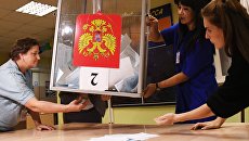 Подсчет голосов на избирательном участке. Архивное фото Подсчет голосов на избирательном участке. Архивное фото
