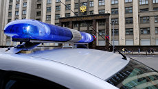 Автомобиль полиции у здания Государственной Думы РФ. Архивное фото Автомобиль полиции у здания Государственной Думы РФ. Архивное фото