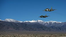 Штурмовики Су-25 ВКС РФ во время совместных учений объединенной группировки Вооруженных сил Киргизии, Центрального военного округа Вооруженных сил РФ и российской авиационной группировки. Архивное фото Штурмовики Су-25 ВКС РФ во время совместных учений объединенной группировки Вооруженных сил Киргизии, Центрального военного округа Вооруженных сил РФ и российской авиационной группировки. Архивное фото