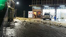Улица в Туапсе, подтопленная в результате сильных дождей Улица в Туапсе, подтопленная в результате сильных дождей