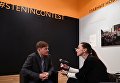 Фотограф Алексей Филиппов (Россия), занявший второе место в номинации Спорт. Серии и третье место в номинации Портрет. Герой нашего времени. Одиночные работы отвечает на вопросы журналиста на открытии выставки победителей IV международного конкурса фотожурналистики имени Андрея Стенина в Москве Фотограф Алексей Филиппов (Россия), занявший второе место в номинации Спорт. Серии и третье место в номинации Портрет. Герой нашего времени. Одиночные работы отвечает на вопросы журналиста на открытии выставки победителей IV международного конкурса фотожурналистики имени Андрея Стенина в Москве