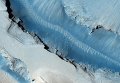 Снимок поверхности Марса, полученный камерой HiRISE Снимок поверхности Марса, полученный камерой HiRISE