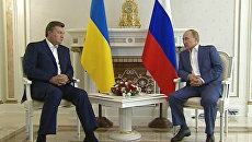 Янукович попросил Путина помочь во вступлении в ШОС Янукович попросил Путина помочь во вступлении в ШОС