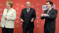 Президент России Владимир Путин и канцлер ФРГ Ангела Меркель Президент России Владимир Путин и канцлер ФРГ Ангела Меркель