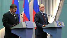 В. Путин встретился с М. Мурси В. Путин встретился с М. Мурси