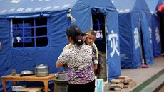 Палаточный лагерь недалеко от эпицентра землетрясения, произошедшего в провинции Сычуань на юго-западе Китая Палаточный лагерь недалеко от эпицентра землетрясения, произошедшего в провинции Сычуань на юго-западе Китая