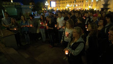 Томичи зажгли около 200 свечей в память о жертвах терактов Томичи зажгли около 200 свечей в память о жертвах терактов